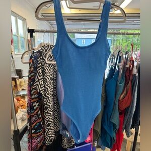 New with tags and liner; never worn